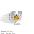 Detail of two-tone stainless steel sea shell ring with textured silver band and gold shell - Coral Texture Shell Ring (JDR2507121-4)
