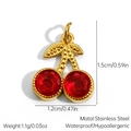 Macro detail of a 1.5cm cherry pendant in gold stainless steel with red rhinestones - Rhinestone Cherry (JDP2507221-4)