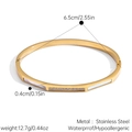 Detail view of 18k gold plated stainless steel bangle with dimensions and weight specs - Pearl Shell Rhinestone Style (JDB2509122)