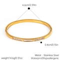Detail of 18k gold plated stainless steel bangle with white shell and zircon inlay - Pearl Shell Multi-Rhinestone Style (JDB2509123)