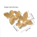 Golden double butterfly earrings with textured finish and dimension markings - Overlapping Butterfly Earrings (JDE2502035)