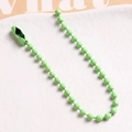 Detail of light green painted metal ball bead chain with matching connector link - Grass Green