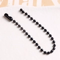 Detail of glossy black metal ball chain with secure connector for DIY accessories - Black
