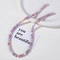 Macro detail of 8mm purple and pink ice cracked natural stone round beads for DIY jewelry - Style 3 / 8mm (Approx. 100 Pcs/Strand) / Purple Pink White Marbled