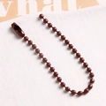 Macro view of dark brown ball chain with connector clasp for DIY jewelry and tags - Dark Coffee