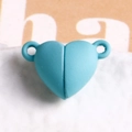 Macro shot of sky blue heart magnetic clasp with matte finish for DIY jewelry crafting - Lake Blue