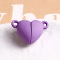 Macro view of purple matte heart magnetic clasp for DIY jewelry and bracelet assembly - Purple