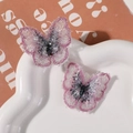 Pink butterfly hair accessory set with sequins and beads on a ceramic plate - Deep Pink
