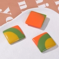 Macro view of 23mm square resin accessory featuring orange green and yellow tricolor stripes - Square Yellow Green Orange Large