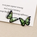 Macro view of handmade green and black resin butterfly charms with gold glitter details - 1# Small Green Black Texture (B70-3-9-13)