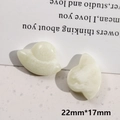 Detail von 22mm hellgrünen UFO-Harzanhängern für DIY-Schmuck mit Steintextur - Leuchtendes Raumschiff