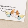 Macro view of multi-color gradient resin butterfly charm with embedded gold leaf foil - 6# Small Multicolored Patchwork (B70-3-9-13)