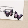 Detail shot of blue and purple resin butterfly charms with gold flakes and starry texture - 7# Small Purple Black Starry (B70-3-9-13)