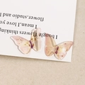 Macro view showing the translucent purple gradient resin butterfly with gold leaf flakes - 8# Small Light Pink Purple Gradient (B70-3-9-13)