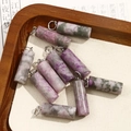 Macro shot of cylindrical purple natural stone pendants with silver metal jump rings - Purple Mixed Mottled Style (No. 11)