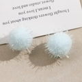 Macro detail of light blue plush pompom earrings with colorful laser glitter threads - 25mm / Light Blue