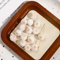 Cute white flocked cat paw beads for DIY earrings and jewelry making with 45-degree angle view - Cat Paw Shape / 1 Piece / Brown