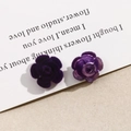 Close-up of deep purple flocked velvet rose earrings on a white display card - Dark Purple