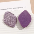 Macro view of purple leaf resin charms with embossed texture and glittery pearlescent finish - Purple