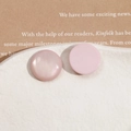 Detailed view of pink cat eye and matte resin round studs on a ceramic tray - Light Pink Round