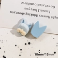 Detail of light blue flocked cat ear DIY accessories with small yellow bows, 18mm by 15mm - Puppy Head