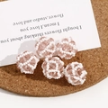 Macro view of five handmade woven bead spheres with pink crystals and white seed beads - 1 Piece / Chrysanthemum Pink