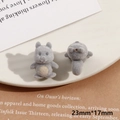 Vista detallada de dos miniaturas de hámster gris flocado mostrando frente y dorso - Ratón Gris (Medio Agujero)