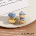 Lindas figuras de pato amarillo flocado con gorros y bufandas azules, 26x17mm - Pato con Sombrero Azul (Medio Agujero)
