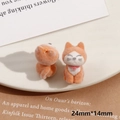 Primer plano de lindas figuras de gatos naranjas con textura flocada y dimensiones - Perro Naranja (Medio Agujero)