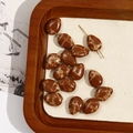 Detailed view of brown teardrop stone beads with retro marble texture for jewelry DIY - 1 Piece/Pack / Coffee