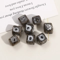 Macro detail of cube-shaped ceramic beads with black and white spotted reactive glaze finish - 12mm (1 Piece) / Gray