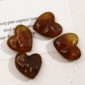 Amberkleurige hartvormige harsbedels met gepolijste afwerking voor DIY-sieraden - Groot / Bruin