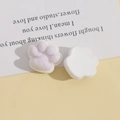 Detail of purple flocked cat paw resin patch for DIY crafts showing front and back textures - Purple