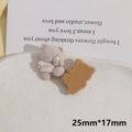 Macro view of flocked bear resin charms showing 25mm size and soft velvet texture - Brown Cola Bear