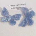 Macro detail of blue marble texture acetate butterfly hair accessories on white tray - Blue Purple Marble Butterfly (Style 3)