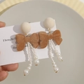 Long drop earrings with plush balls, flocking bows and imitation pearls on a card - Light Coffee