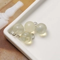 Detail of 12mm green speckled natural stone charms with silver loops for DIY jewelry - Opal