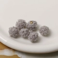 Close-up of grey lamb wool plush ball pendants with gold metal loops for DIY jewelry - Single Pendant (No Chain) / Gray