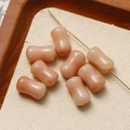 Detailed view of pink rose quartz cylinder beads for DIY jewelry making and necklaces - Red Aventurine