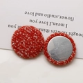 Detail of red bouclé tweed round fabric buttons with metal base for DIY accessories - Red Textured