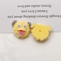 Front and back view of yellow plush dog charm with pink tongue and flat mounting base - Yellow Dog