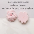 Detail of pink flocked dog charms showing flat back and central hole for DIY assembly - Pink Little Rabbit