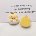 Detail of yellow flocked duck resin charms for DIY crafts showing front and back views - Yellow Duck