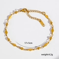 Bracciale minimalista in acciaio al titanio placcato oro 18K con perline e ciondoli - Catena a Grani Geometrici / Oro