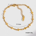 Dettaglio del bracciale a croce in acciaio al titanio placcato oro 18K, 17+5cm - Catena a maglie con croce / Oro