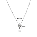 Polished silver heart pendant necklace with beaded snake chain on a white background - Silver Heart