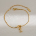 Gouden slangenketting armband met sprankelende zirkonia letter I hanger en verstelbare sluiting - Letter I