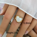 Golden heart ring with white marble inlay, 12.8mm width and 2.4g weight on model hand - Nacre Texture Heart Ring (227) / 12.8mm
