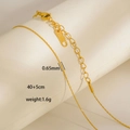 Dettaglio catena sottile 0,65mm in acciaio inox dorato con chiusura a moschettone e gancio - Catena d'Oro Sottilissima (8-3)
