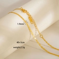 Dettaglio che mostra la larghezza di 1,9 mm e la lunghezza 40+5 cm della collana dorata - Catena a Maglie Metalliche Piatte (8-4)
